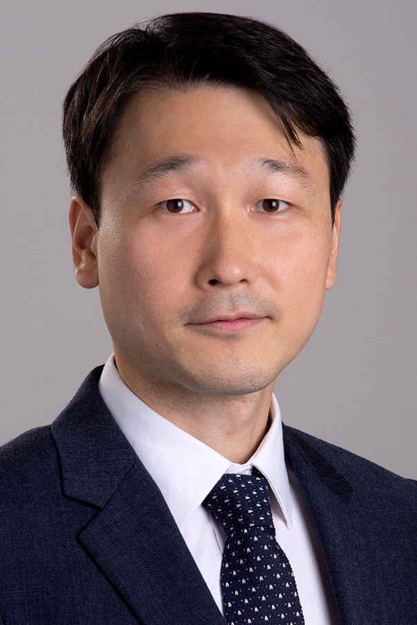 Professor Junghun Cho in a black suit