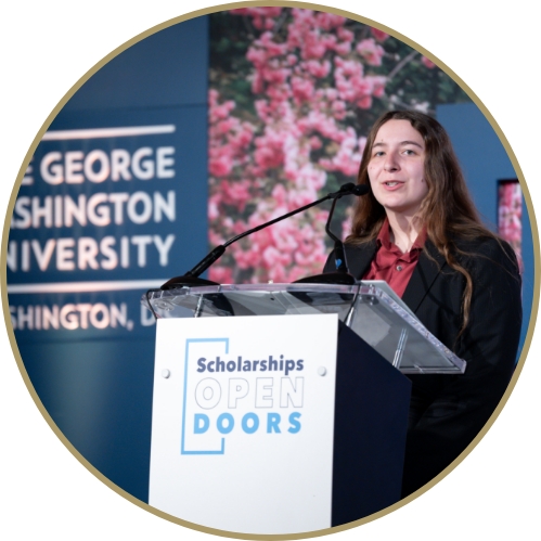 Student standing at an podium
