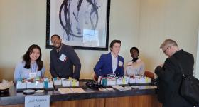 Student volunteers pictured checking in attendees at the annual event